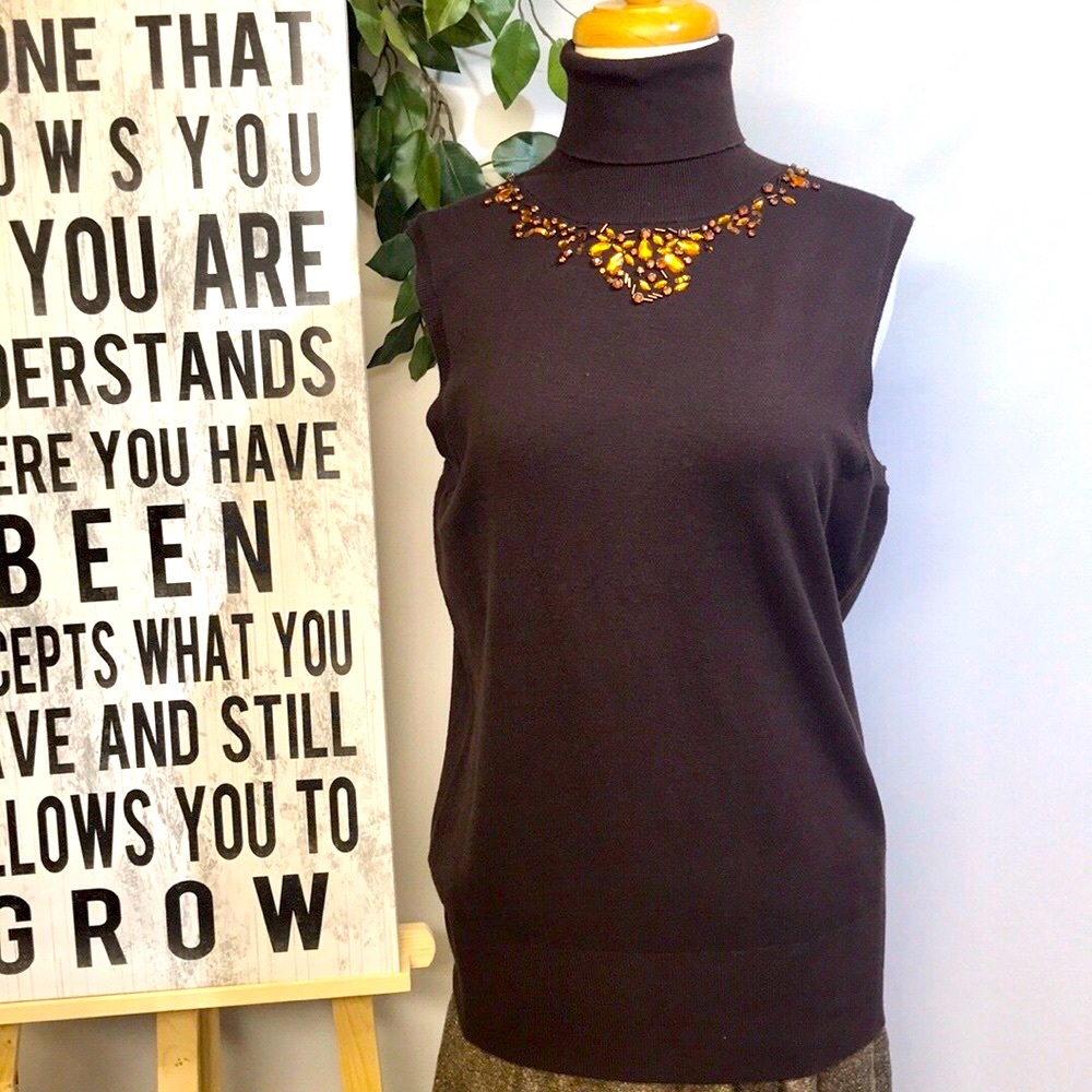 BCBGMAXAZRIA sleeveless turtleneck.